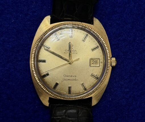 RELOJ OMEGA AUTOMÁTICO AÑOS 70. DE ORO 18KTS Y PULSERA DE PIEL.