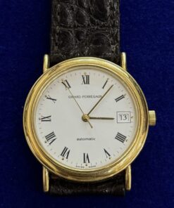 RELOJ GIRARD PERREGAUX AUTOMÁTICO. CON SEGUNDERO CENTRAL DE ORO 18KTS Y PULSERA DE PIEL. AÑO 2000 REF:4799