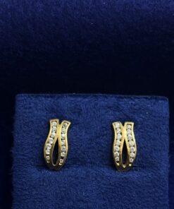 Pendientes de circonitas. Montado en oro de ley 18kts.