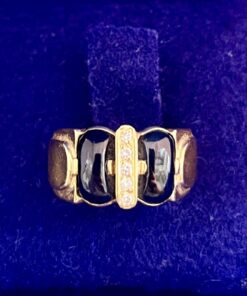 Sortija con dos zafiros talla cabujón auténticos y brillantes montado en oro amarillo de 18 kts.