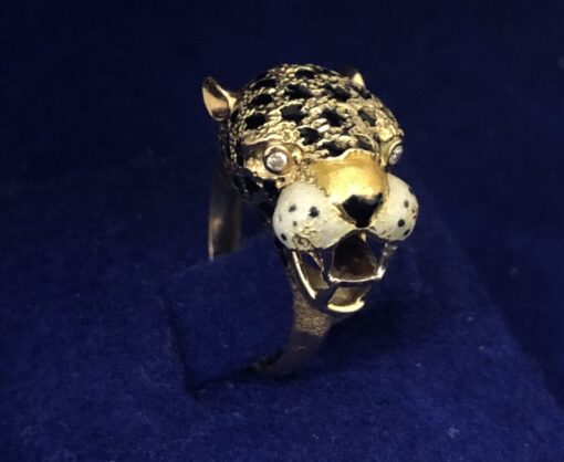 Sortija vintage (años 80) de leopardo en oro amarillo de ley 18 kts con ojos de brillantes 0,04 cts