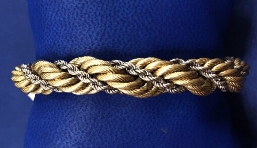 Brazalete de cordón salomónico bicolor en oro de ley 18 kts.
