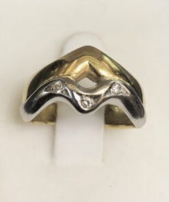 Sortija bicolor con brillantes en oro de ley 18 kts.