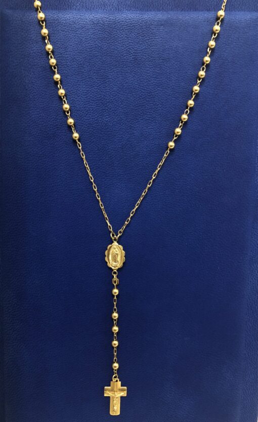 Rosario con medalla de la Virgen de Guadalupe y cruz con Cristo, todo realizado en oro amarillo de ley 18 kts.