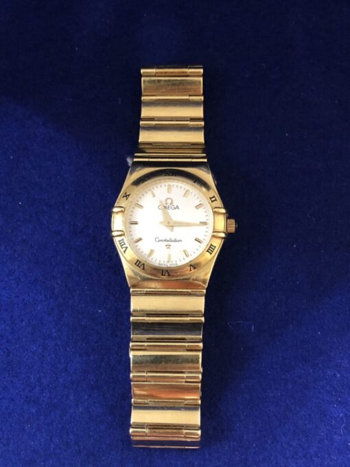 Reloj Omega Constellation de señora, en oro amarillo de ley 18 kts., mecanismo de cuarzo, año 1998.
