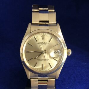 Rolex Oyster Perpetual Date, tamaño cadete (34 mm), esfera champagne, en oro amarillo de ley 18 kts., automático, año 1962.