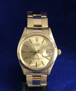 Rolex Oyster Perpetual Date, tamaño cadete (34 mm), esfera champagne, en oro amarillo de ley 18 kts., automático, año 1962.