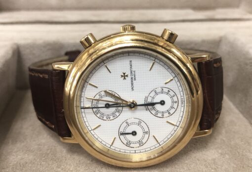 Reloj Vacheron Constantin Chronograph de caballero, automático, con correa marrón de piel genuina, caja en oro de ley 18 kts., año 1991.