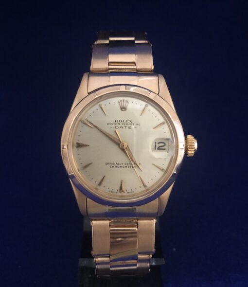 Rolex Oyster Perpetual Date en oro rosa de ley 18 kts., 31 mm., movimiento de cuerda manual, esfera argenté, año 1959.