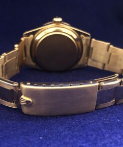 Alternative view of Rolex Oyster Perpetual Date en oro rosa de ley 18 kts., 31 mm., movimiento de cuerda manual, esfera argenté, año 1959.