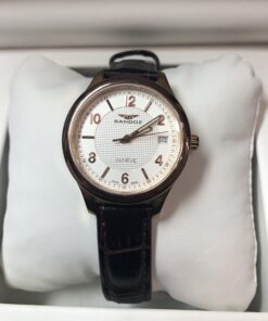 Reloj Sandoz Modelo 81312-0058, 31mm, calendario y  agujas luminiscentes, mecanismo de cuarzo. Maquinaria suiza y cristal de zafiro. De acero con baño de oro rosa.