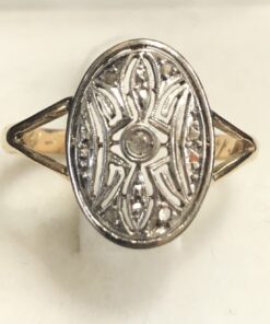 Sortija Art Decó con vistas en platino con brillantes, en oro amarillo de ley 18 kts.