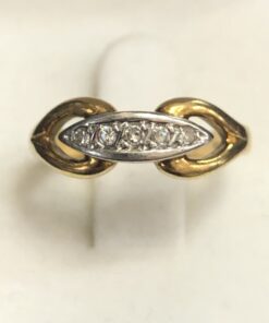 Sortija vintage (años 80) con 0'10 cts de brillantes en oro blanco y amarillo de ley 18 kts.
