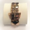 Espectacular brazalete de los años 40 en forma de cinturón con hebilla, en oro rosa de ley 18 kts.