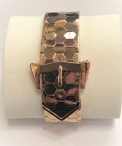 Espectacular brazalete de los años 40 en forma de cinturón con hebilla, en oro rosa de ley 18 kts.