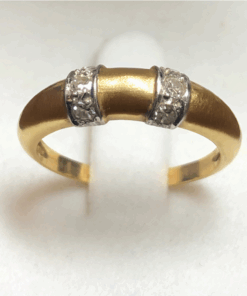 Sortija vintage con dos columnas de brillantes en oro blanco y amarillo de 18 kts.