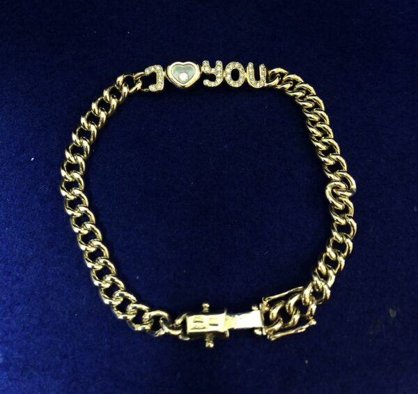 Pulsera Chopard modelo "I love you" Happy Diamonds, en oro de ley 18 kts, con contrastes originales de la marca. - Imagen 2