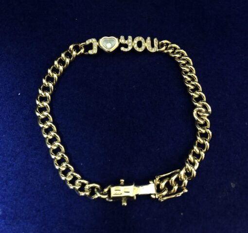 Pulsera Chopard modelo "I love you" Happy Diamonds, en oro de ley 18 kts, con contrastes originales de la marca. - Imagen 2