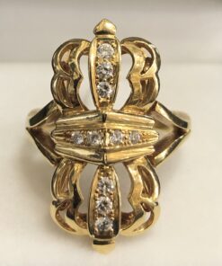 Sortija lanzadera de estilo vintage, con 0'25 cts de brillantes, en oro amarillo de ley 18 kts.