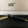 Pluma estilográfica retráctil Montblanc, modelo Boheme Doue, chapada en oro con detalle de ónix.