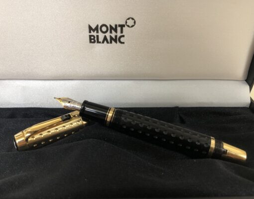 Pluma estilográfica retráctil Montblanc, modelo Boheme Doue, chapada en oro con detalle de ónix.