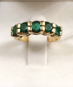 Cintillo con auténticas esmeraldas colombianas, en oro amarillo de ley 18 kts.