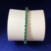 Pulsera rivière con 22 cts. de auténticas esmeraldas colombianas, en oro blanco de ley 18 kts.