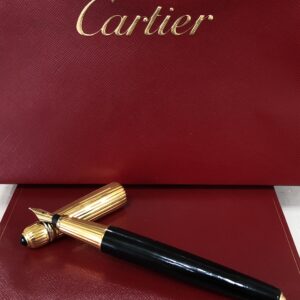 Pluma estilográfica Pasha de Cartier, año 1989, chapada en oro con plumín en oro de ley 18 kts.