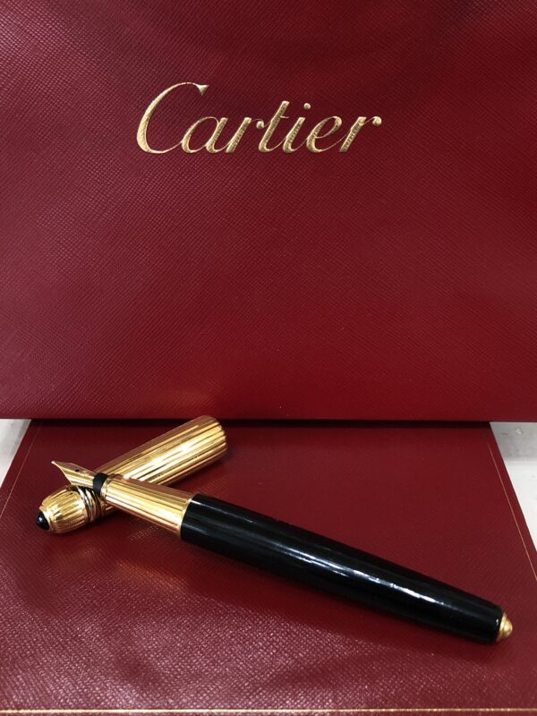 Pluma estilográfica Pasha de Cartier, año 1989, chapada en oro con plumín en oro de ley 18 kts.