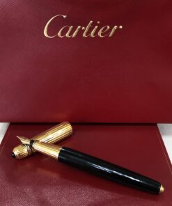 Pluma estilográfica Pasha de Cartier, año 1989, chapada en oro con plumín en oro de ley 18 kts.
