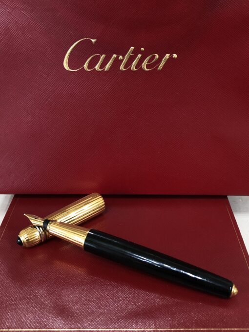 Pluma estilográfica Pasha de Cartier, año 1989, chapada en oro con plumín en oro de ley 18 kts.