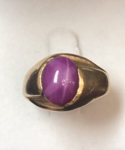 Sello vintage con un precioso rubí estrella natural, en oro amarillo de ley 18 kts.