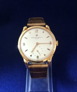 Reloj de caballero Vacheron Constantin con cronógrafo, mecanismo de cuerda manual, con pulsera marrón de piel genuina, caja y hebilla original en oro de ley 18 kts.
