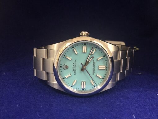 Rolex Oyster Perpetual Tiffany blue, 41mm, en acero, automático, año 2022. Ref.: 124300, con caja y papeles originales.
