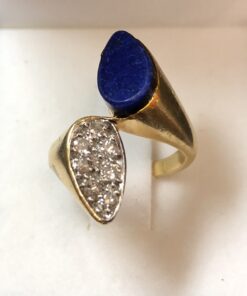Sortija "tú y yo" de lapislázuli y 0'20 cts de diamantes en oro amarillo de ley 18 kts.