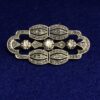 Broche Art Decó con 1'20 cts (aprox.) de diamantes talla antigua en oro de ley 18 kts con vistas en platino.