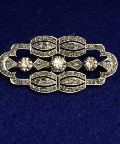 Broche Art Decó con 1'20 cts (aprox.) de diamantes talla antigua en oro de ley 18 kts con vistas en platino.