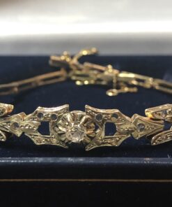 Pulsera de pedida de los años 30 con zafiros blancos en oro de ley 18 kts.