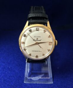 Reloj Duward vintage de caballero, con fecha, 35mm, en oro de ley 18 kts. con pulsera de piel genuina. Automático