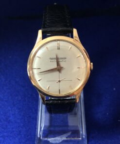 Reloj Jaeger Le Coultre vintage de caballero, esfera de 34mm, en oro de ley 18 kts con pulsera de piel genuina, automático.