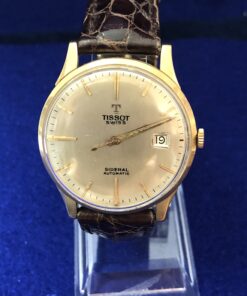 Reloj TISSOT SIDERAL vintage de caballero, esfera de 36mm, en oro de ley 18 kts. con pulsera marrón de piel genuina. AUTOMÁTICO