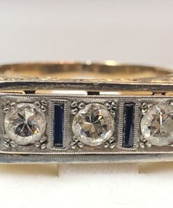 Tresillo de caballero Art Decó con 0'20 cts de brillantes y 2 bandas de zafiros realizado en oro amarillo de ley 18 kts con vistas en platino