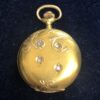 Pequeño reloj de bolsillo de principios del s. XX (ca. 1905) con diamantes montado en oro amarillo de ley 18kts