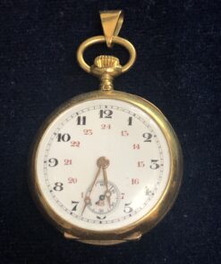 Reloj suizo de bolsillo con cronógrafo, realizado en oro amarillo de ley 18 kts.