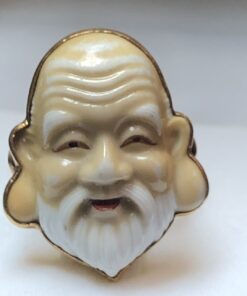 Sortija Toshikane con cerámica de dios japonés de la sabiduría montado en oro de ley 18 kts.