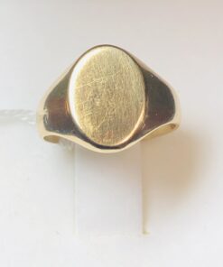 Sello liso para dedo meñique realizado en oro amarillo de ley 18 kts.