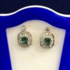 Pendientes con 1 ct de diamantes en total y 1'20 ct de esmeraldas colombianas realizados en oro de ley 18 kts