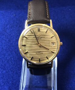 Reloj Eternamatic 3003 de Luxe, automático, con esfera dorada texturizada realizado en oro amarillo de ley 18 kts