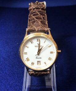 Reloj Viceroy vintage, de esfera blanca con fecha, mecanismo de cuarzo, realizado en oro amarillo de ley 18 kts.