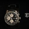 Reloj Eberhard & Co. Traversetolo con fecha y cronógrafo, automático, en acero con pulsera negra de caucho, año 2008. Con caja y papeles originales.